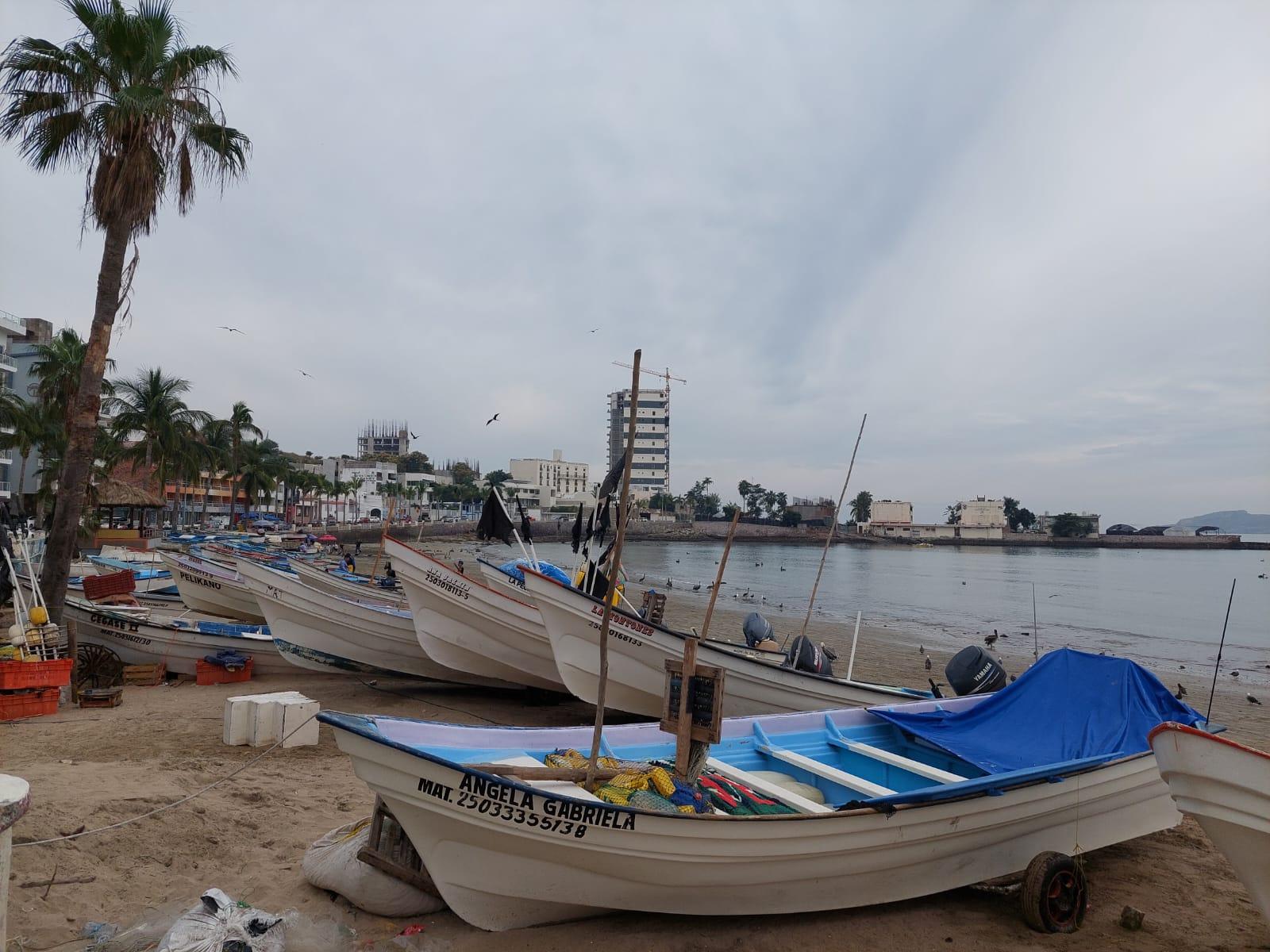 Un barco en la playa

Descripción generada automáticamente